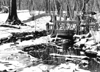 Wooden Bridge over the Gill with snow and ice, Central Park, NYC